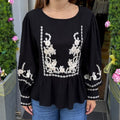Blouse noire brodée