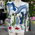 Pull imprimé visage abstrait