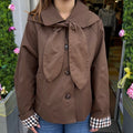 Veste marron à col noué